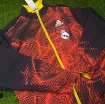 Picture of Real Madrid 2024 Double Sided Jacket Black & Red/Yellow